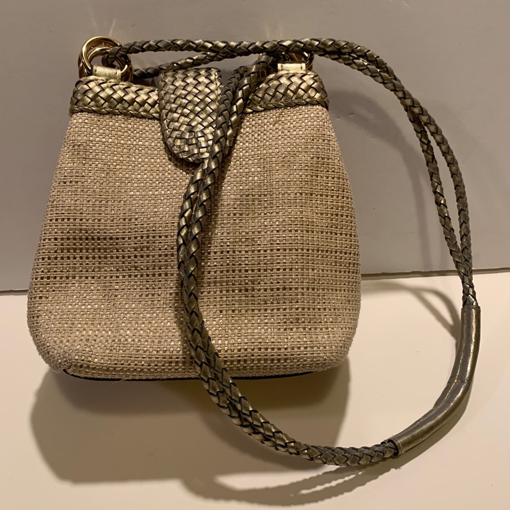VINTAGE WOMEN’S WARREN REED SHOULDER BAG.
